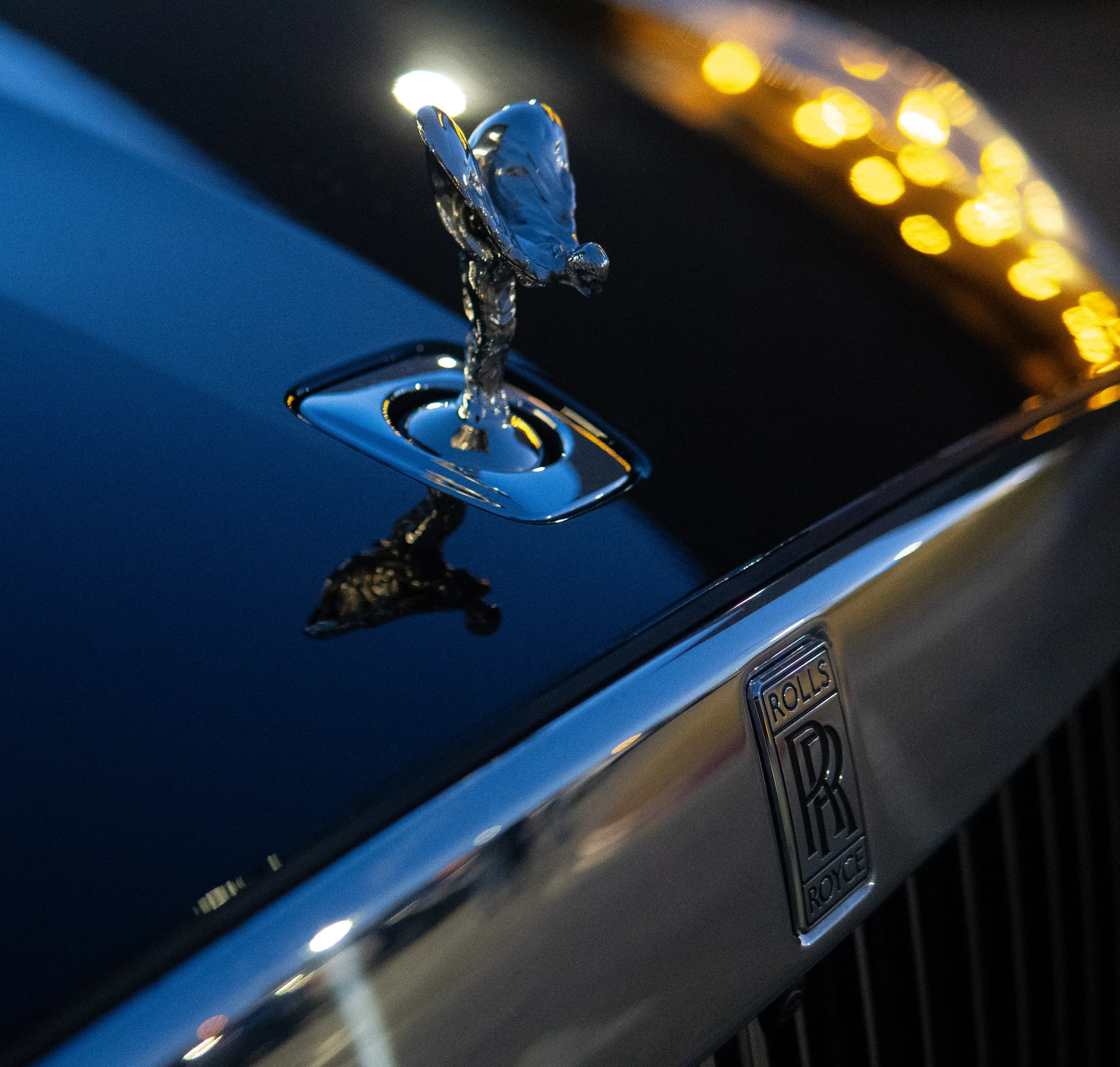 Rolls-Royce Spirit of Ecstasy ornament at night